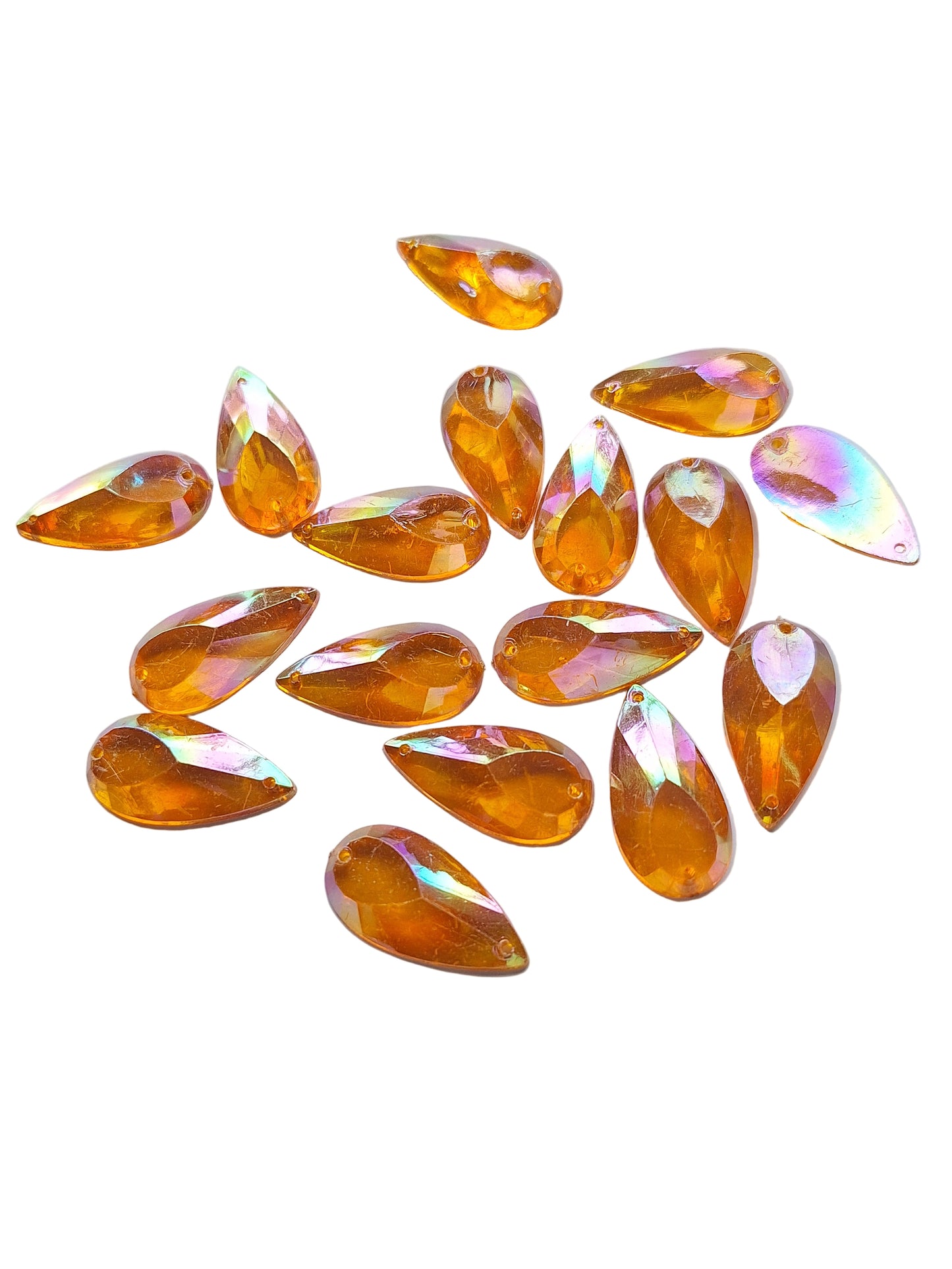 Group shot of vintage topaz AB acrylic teardrop cabochon, table-cut with two-hole sew-on flat back, with one upside-down to show the back, 14×27 mm.