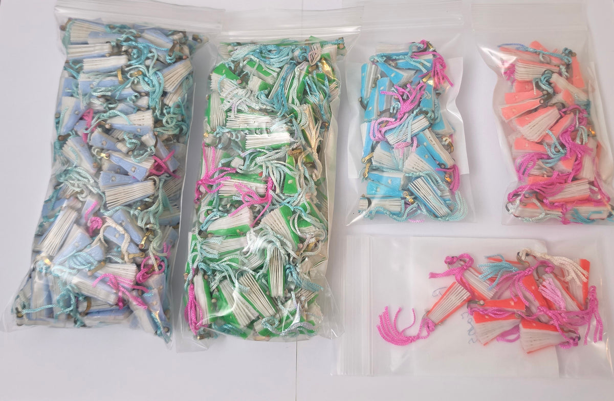 400 vintage miniature plastic folding fans sorted into bags by color: blue, green, aqua, pink, and red.