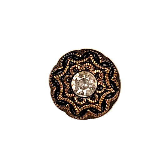 Jet and gold glass button with filigree design and a central rhinestone