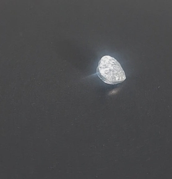 Clear silver-back mirrored glass button, heart shape, with crackle-textured surface, 11.4mm/18L, shown in video with light movement to display the mirrored finish and back.