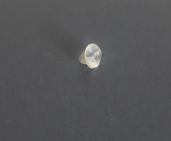 Mirrored glass button with oval jeweled design, 15mm, , shown in video with light movement to display the mirrored finish and back.