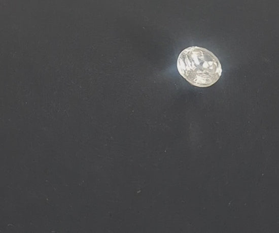 Mirrored glass button with concave form and beveled top edge, 11.4mm, , shown in video with light movement to display the mirrored finish and back.