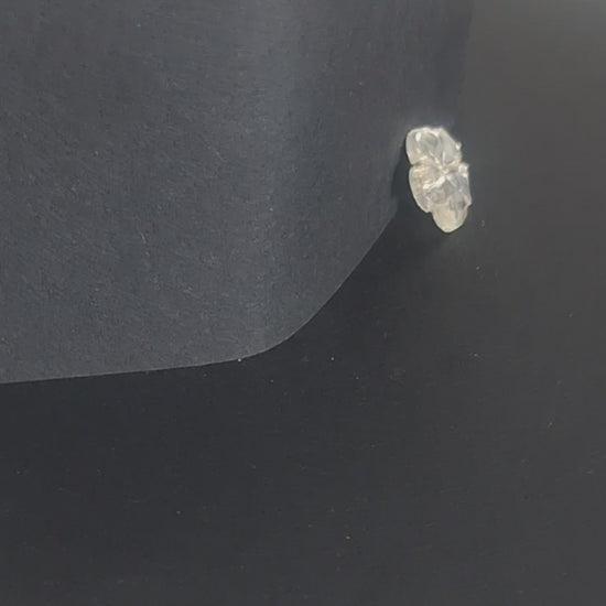 Mirrored glass button with 5-petal flower design and two-hole center, 18mm size, vintage Czechoslovakia, shown in video with light movement to display the mirrored finish.