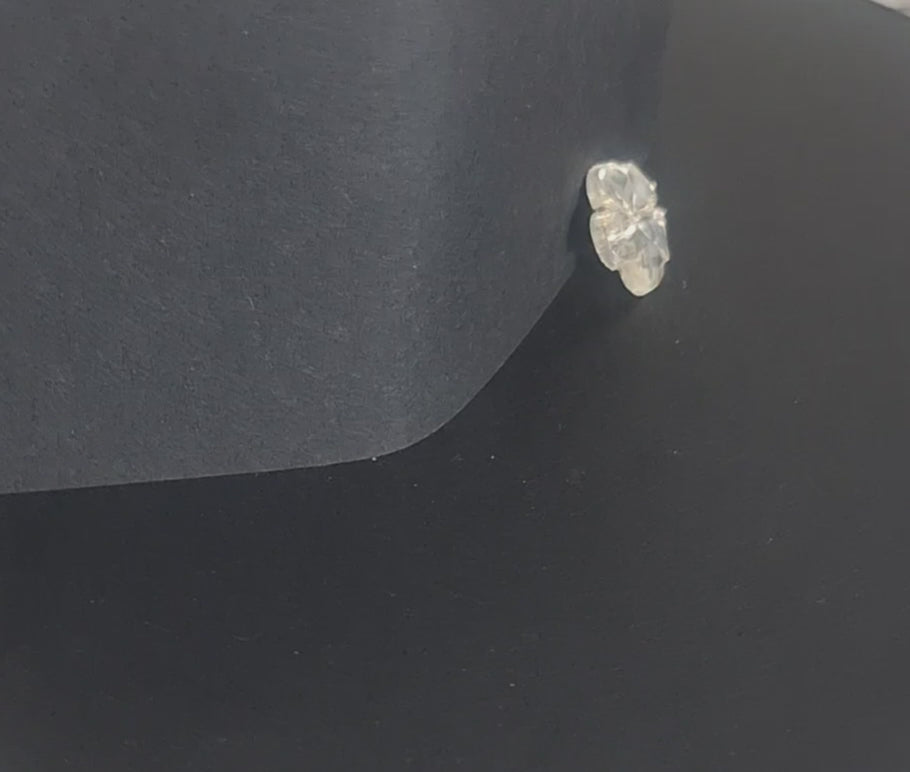 Mirrored glass button with 5-petal flower design and two-hole center, 18mm size, vintage Czechoslovakia, shown in video with light movement to display the mirrored finish.