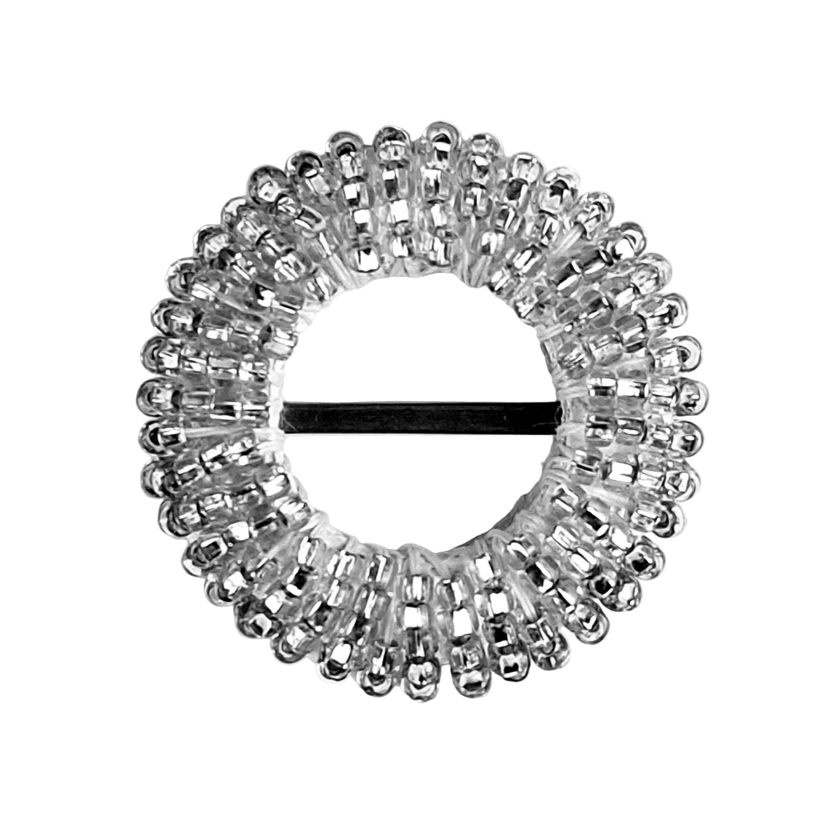 Silver buckle: Round silver beaded buckle with densely sewn seed beads and a central brass bar.